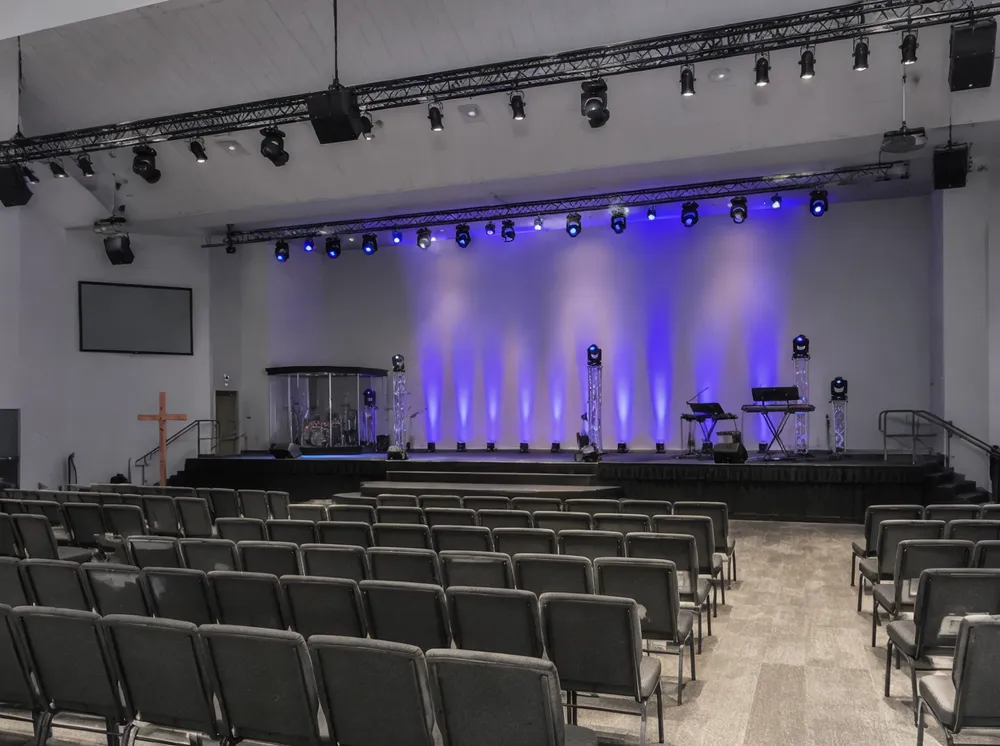 Identical LED stage lighting fixtures installed across multiple church campus locations for visual consistency