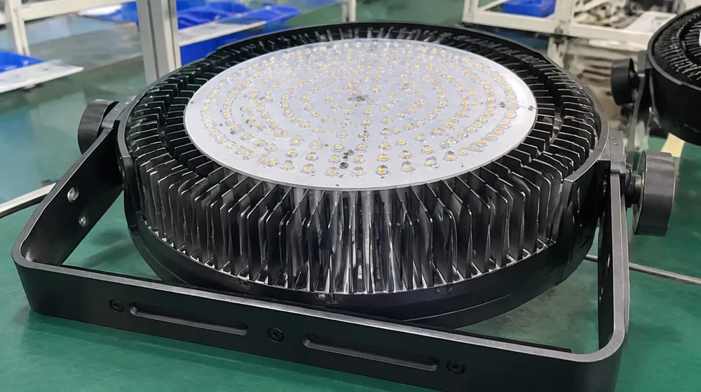 Oversized aluminum heat sink on LED church stage fixture showing thermal mass relative to LED array