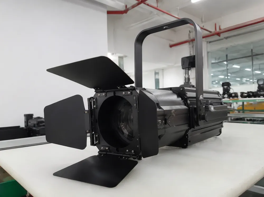LED profile ellipsoidal fixture with framing shutters for worship broadcast