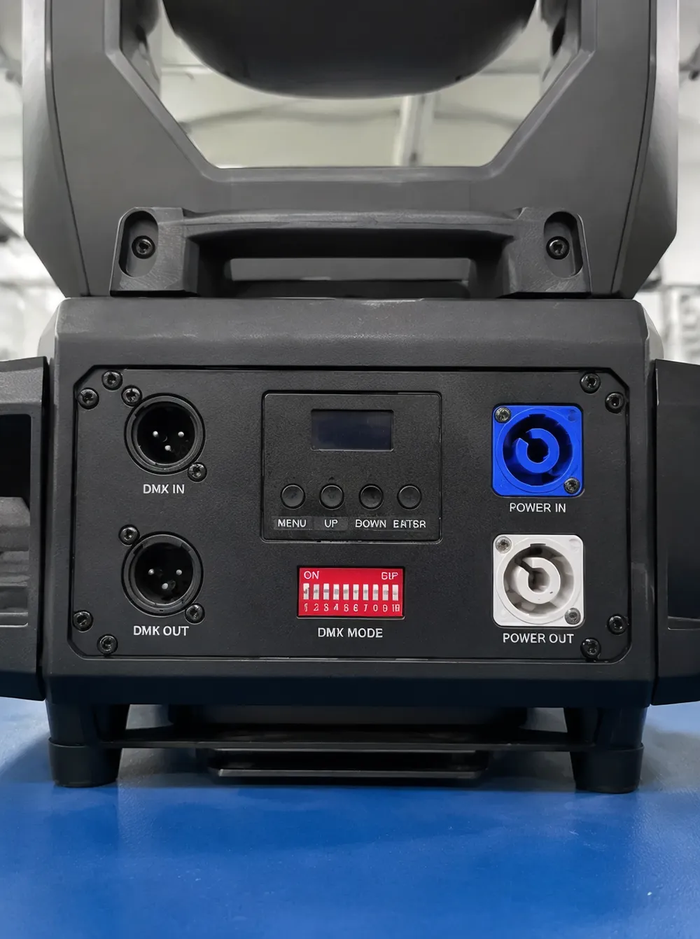 Rear panel of church stage light showing DIP switch and 3-button menu for mode selection