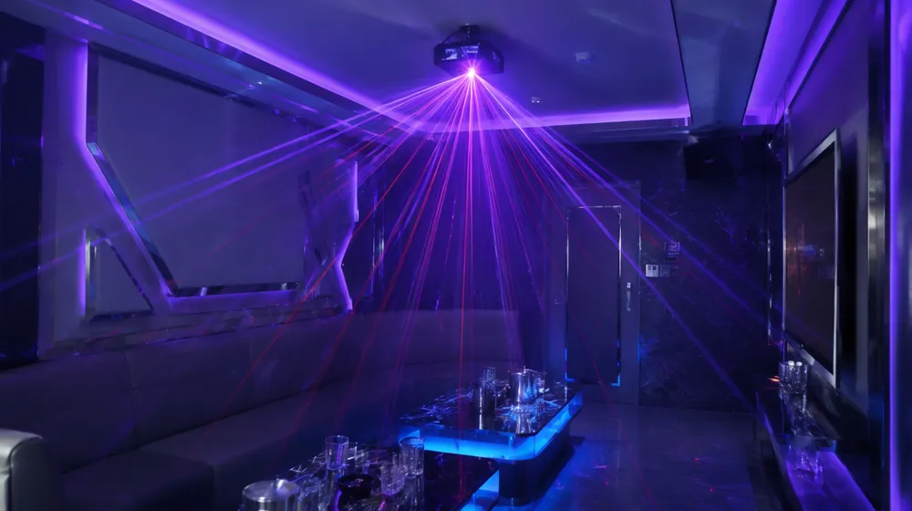 Laser effect unit installed in a KTV karaoke room with ambient lighting