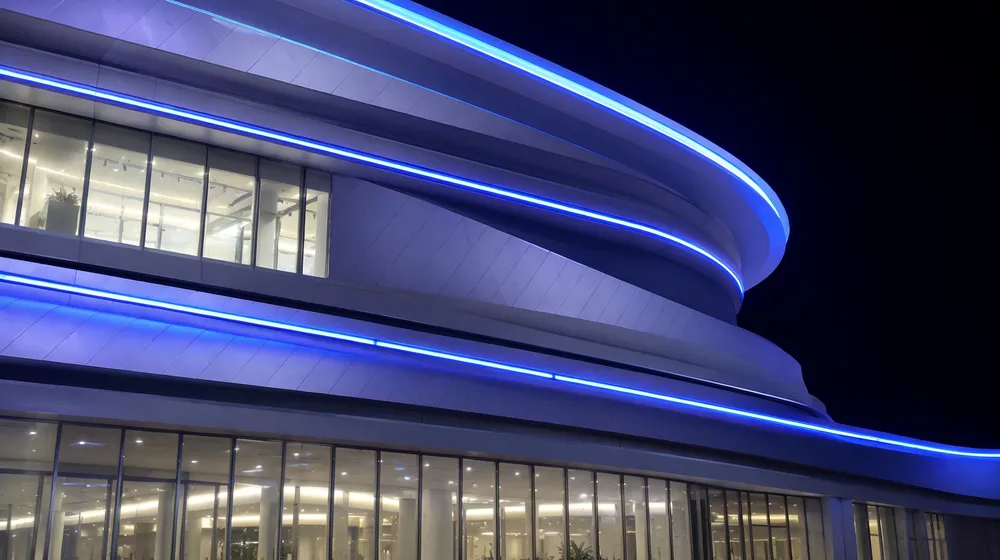 Laser bar integrated into architectural building facade for permanent installation