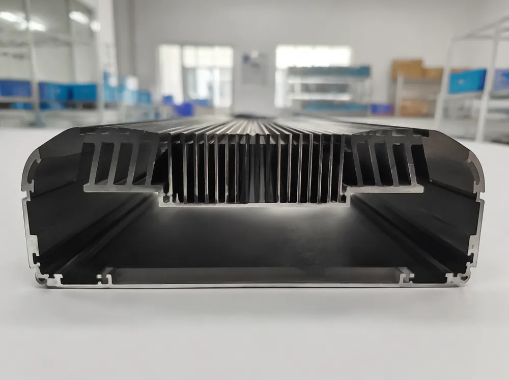 Cross-section view of variable-pitch channeled heatsink design machined into DJ laser bar housing extrusion