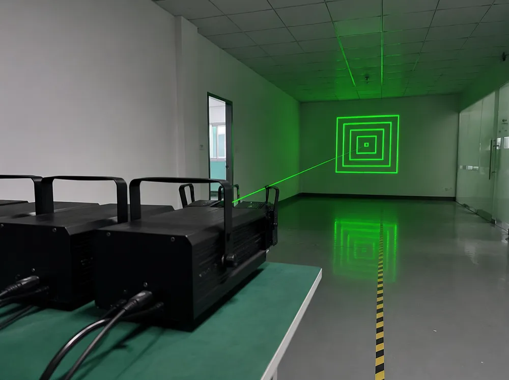 Production calibration setup with laser-etched reference grid at 5-meter distance showing concentric square test pattern alignment
