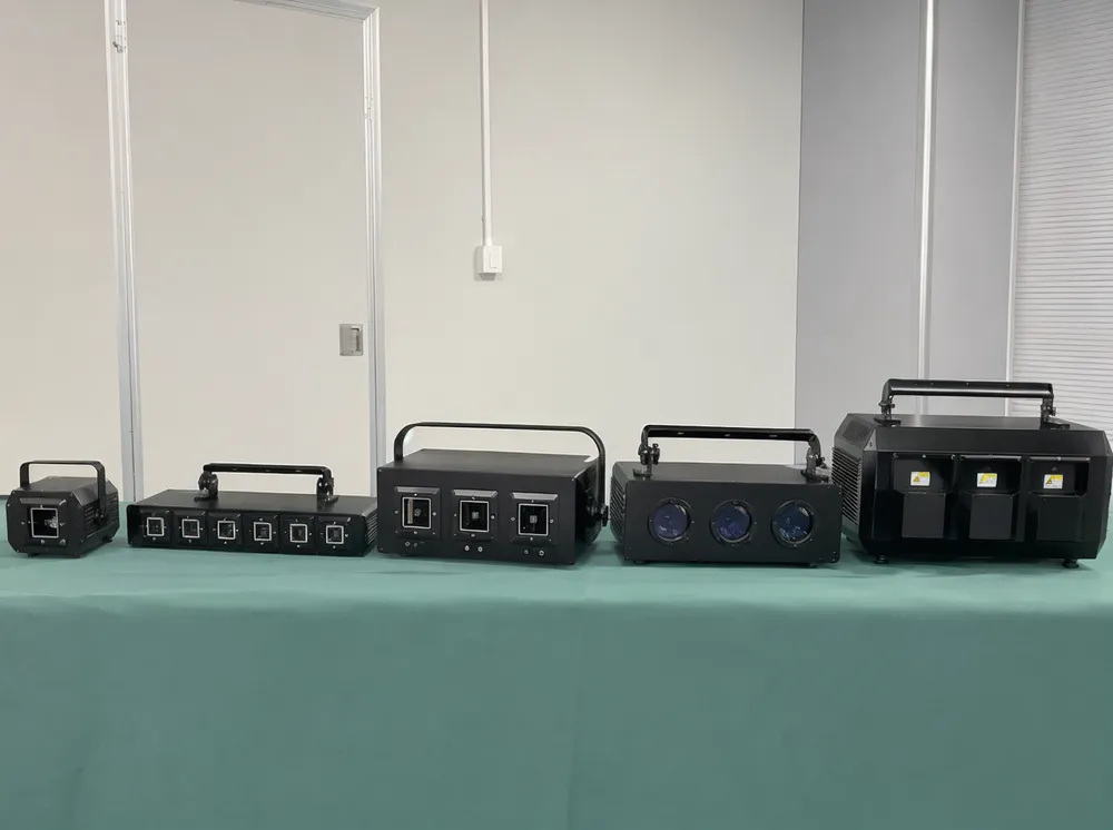 Range of GDMonkey DJ laser lights showing mini, bar, RGB and professional configurations side by side