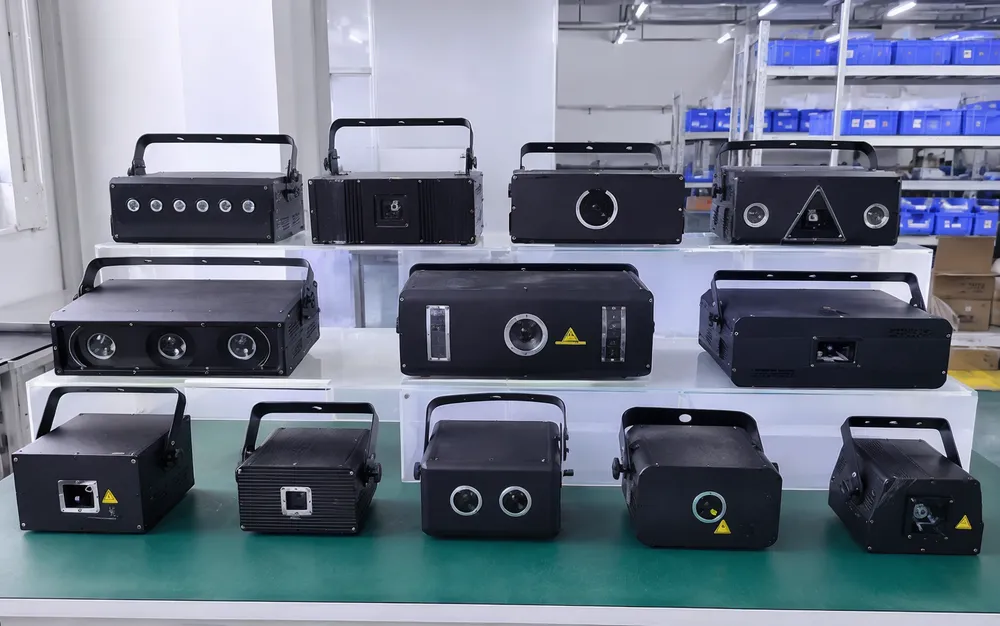 Hybrid LED laser DJ light combining wash effects with laser diodes in single housing