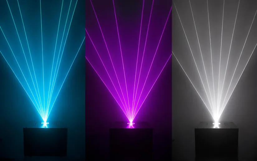 RGB laser projector demonstrating full-color mixing with cyan, magenta and white beam output