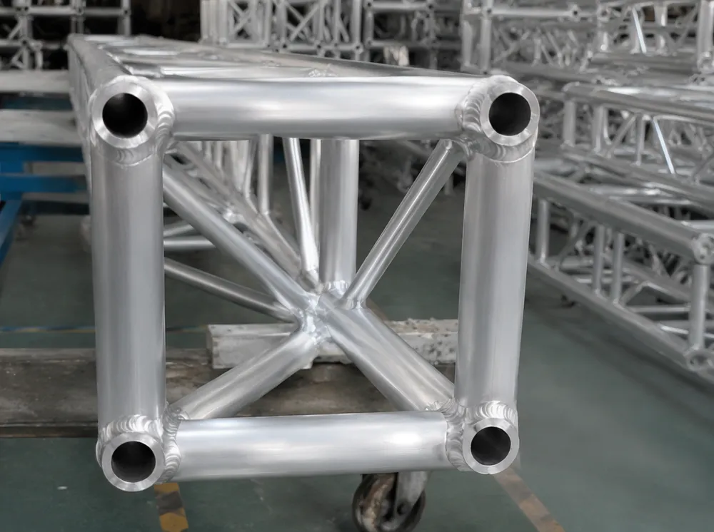 6061-T6 aluminum truss cross-section showing weld joints and anodized finish