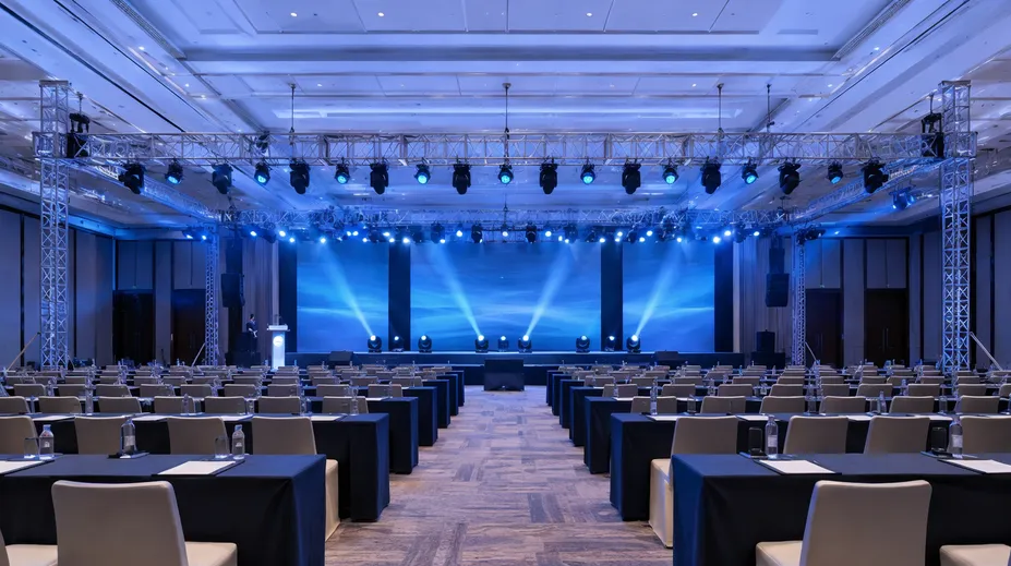 Identical truss lighting setups deployed across multiple corporate event venues