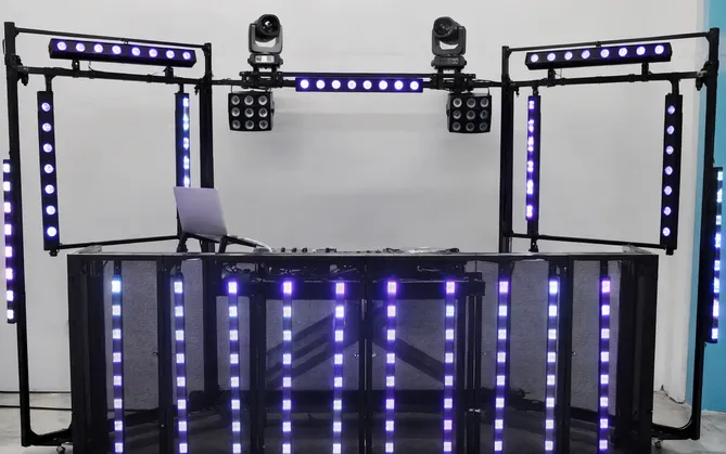DJ booth lights setup with LED wash bars, effect lights, and pixel strips configured for DJ facade mounting