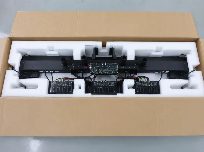 Gigbar system packed in master carton with custom-molded EPE foam inserts protecting PCB and wiring harness