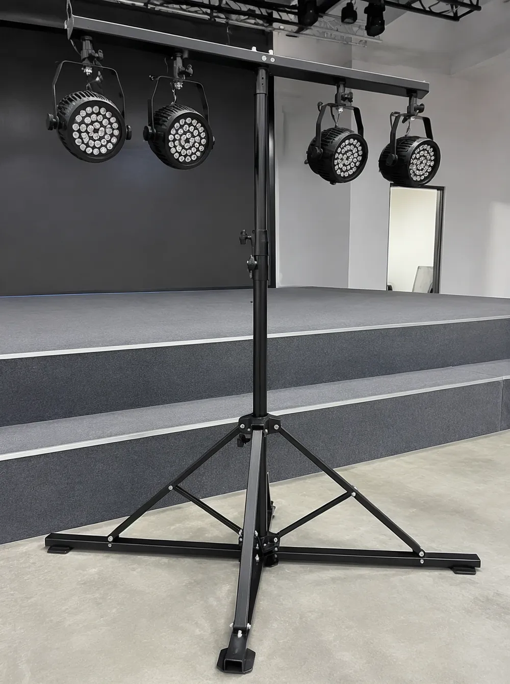 GDMonkey heavy-duty stage lights stand with wide base footprint deployed on a fixed stage installation