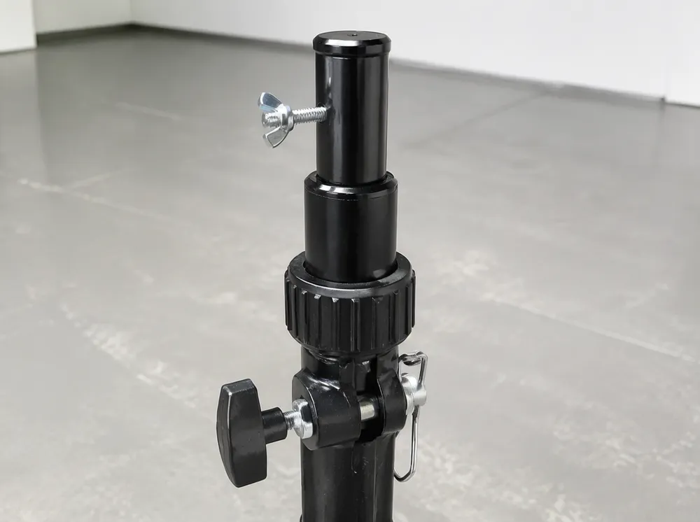 Close-up of 35mm spigot top adapter with M10 bolt on stage lights stand