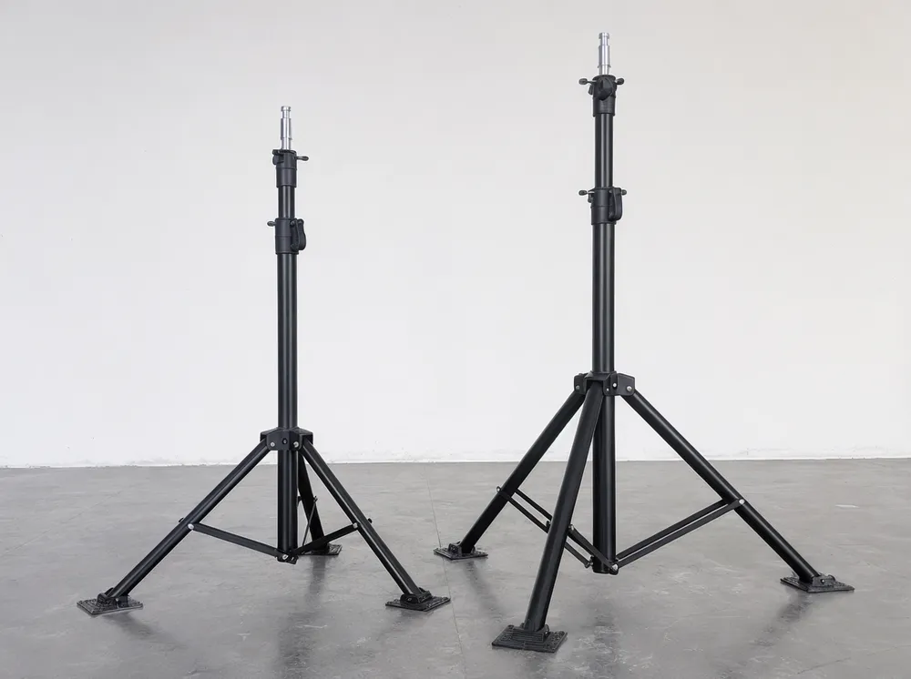 Triangulated steel tube leg construction with ribbed base plates on heavy-duty stage lights stand