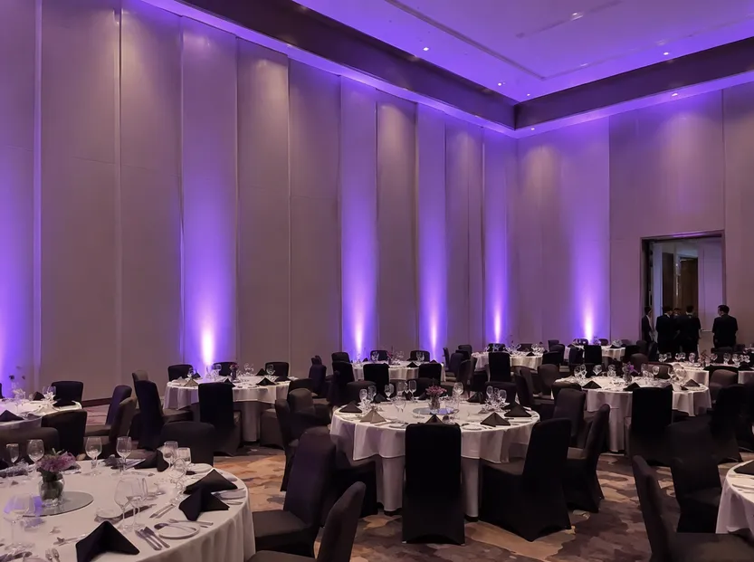 LED par lights installed for permanent ambient uplighting in a hotel event hall
