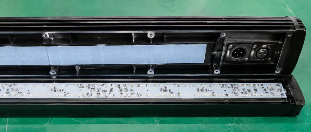 Die-cast aluminum housing of the LED DJ pixel bar showing heatsink fins and thermal interface