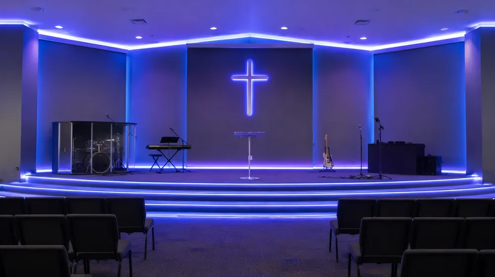 LED tube lights installed along church stage edges and ceiling coves