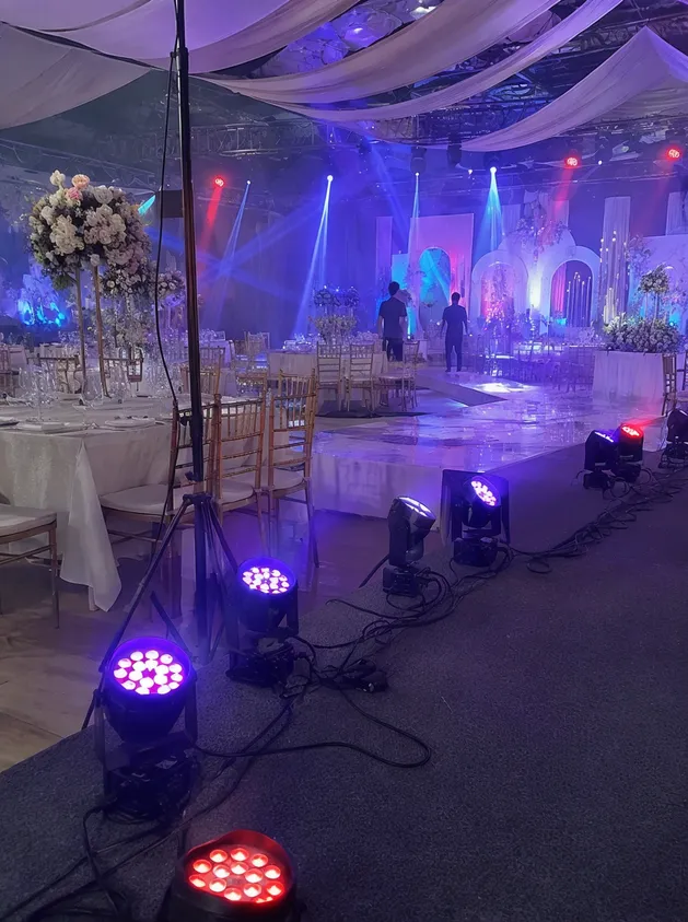 Event rental company setup with multiple mini LED DJ lights deployed at a wedding reception