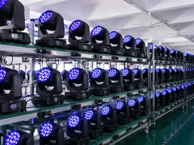 Moving DJ lights on aging test racks running continuous 48-hour burn-in at full electrical and mechanical load