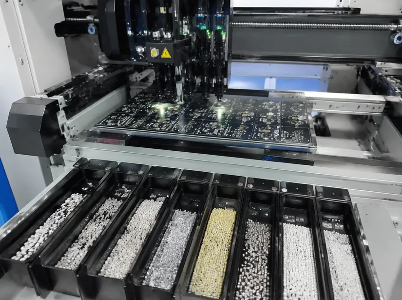 Automated SMT LED chip placement on moving head PCB with bin-sorted components