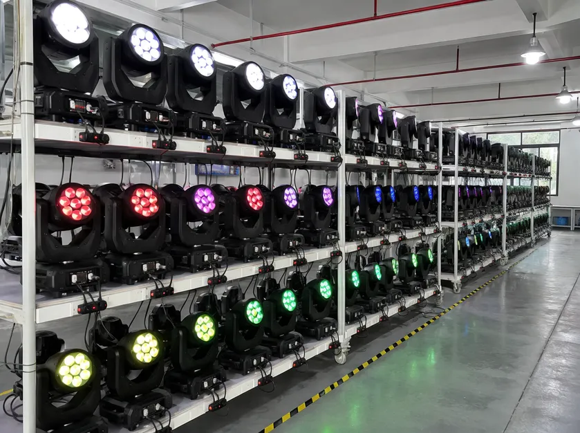 LED moving DJ lights on 48-hour aging test racks with continuous pan/tilt cycling and thermal stress monitoring