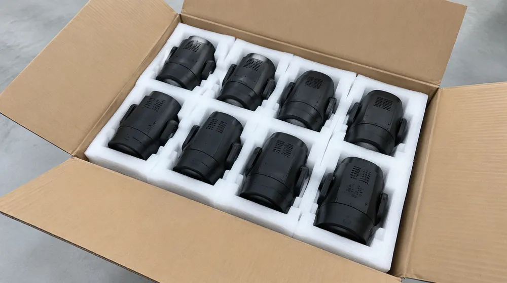 Mini moving head units packed in master carton with molded foam cradles