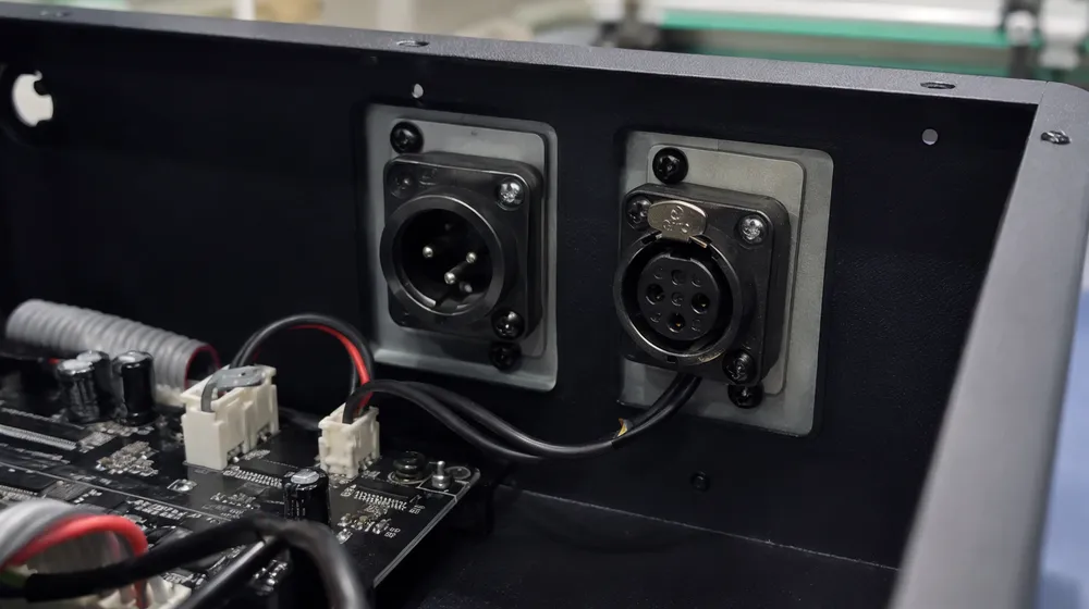 Chassis-mounted XLR connector with reinforced backing plate detail