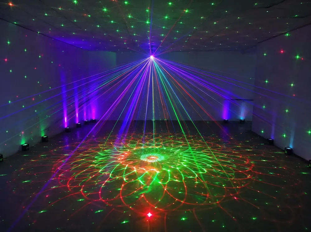 Laser projector party DJ lights — diode laser units producing pattern projections and star fields