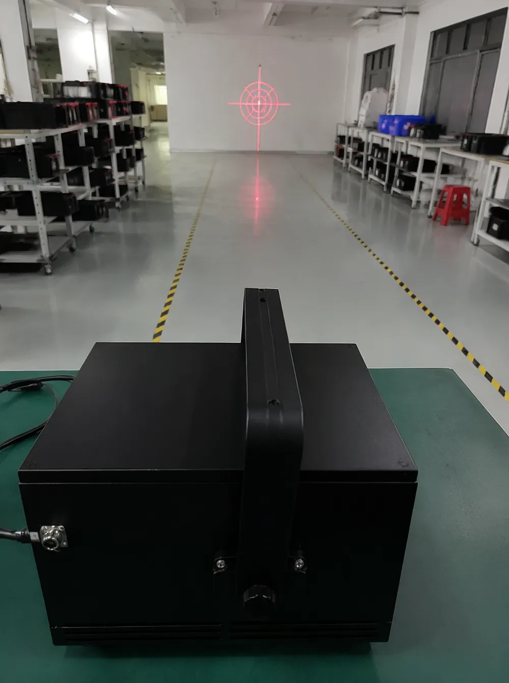 Optical alignment verification using projection calibration target at 5-meter distance in GDMonkey factory