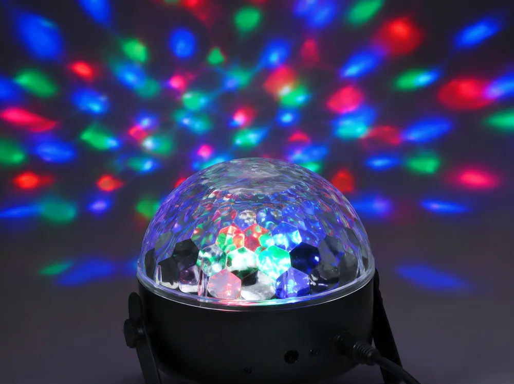 Multi-faceted crystal ball lens dome with internal RGB LEDs producing smooth disco light distribution
