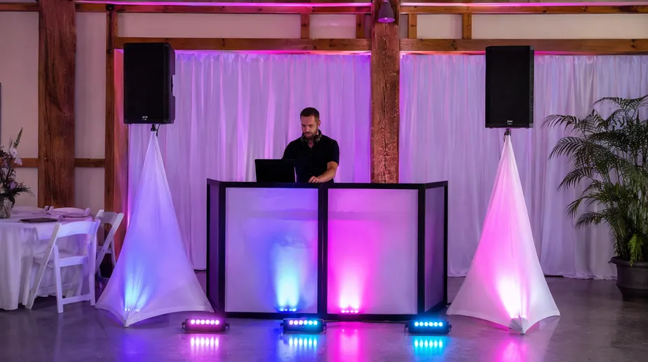 Mobile DJ deploying portable battery-powered lights at event — sub 60 second setup, no cables