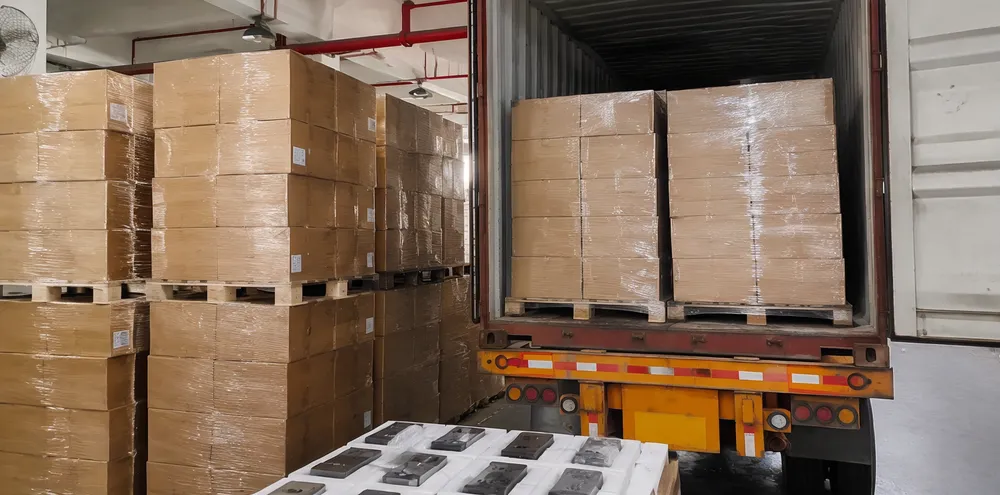 Palletized DJ light fixtures with custom EPE foam inserts loaded for container shipping