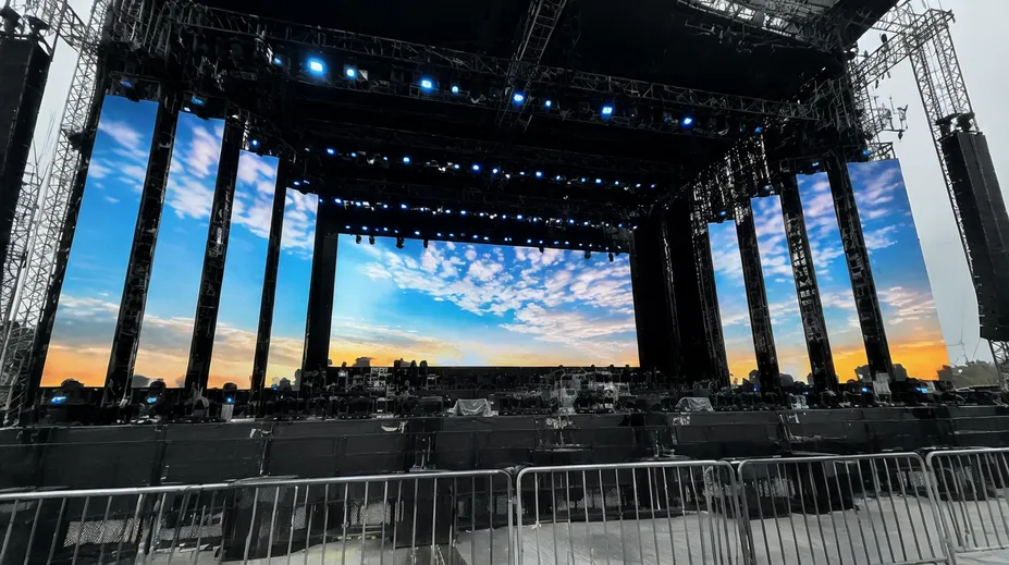 LED backdrop panels deployed on a concert touring stage with modular rigging