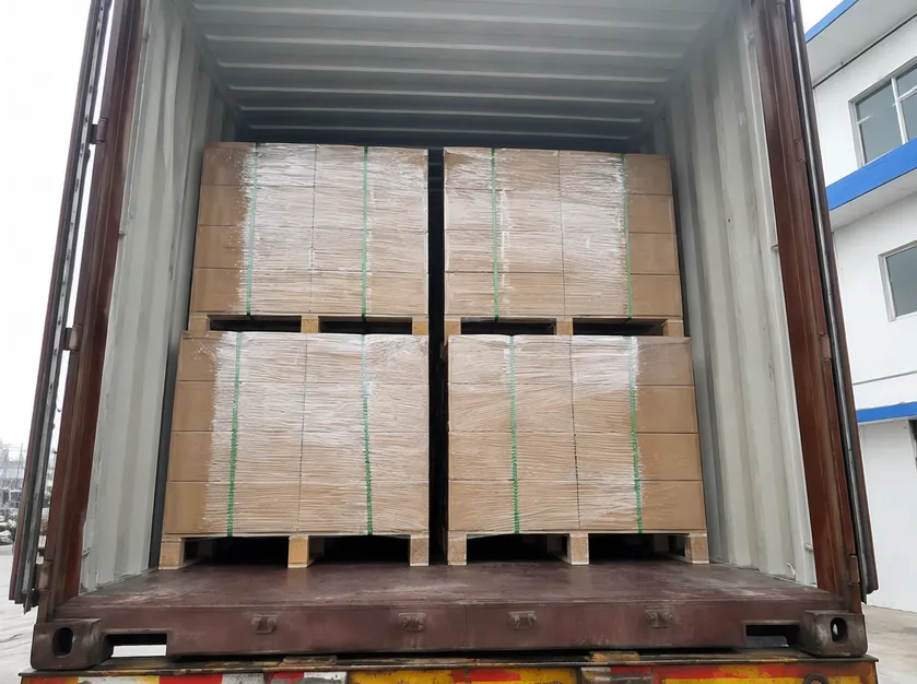 Palletized concert stage lighting fixtures loaded in shipping container