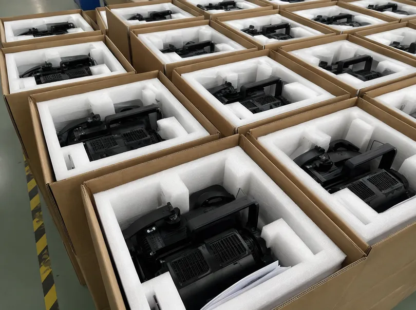 Stage lighting fixtures packed in EPE foam inserts ready for container loading