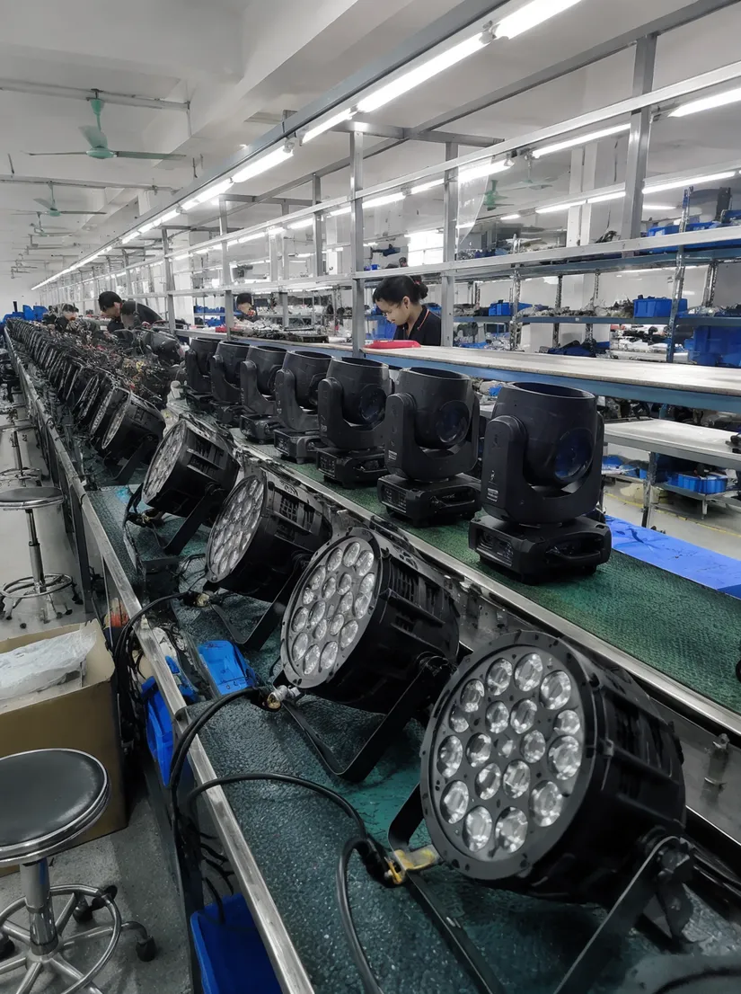 GDMonkey stage lighting manufacturing facility in Guangdong, China — production lines with LED fixtures and moving heads