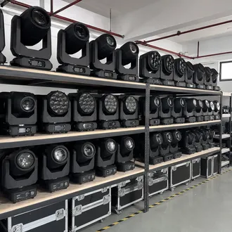AV rental warehouse with mixed moving head inventory on shelves