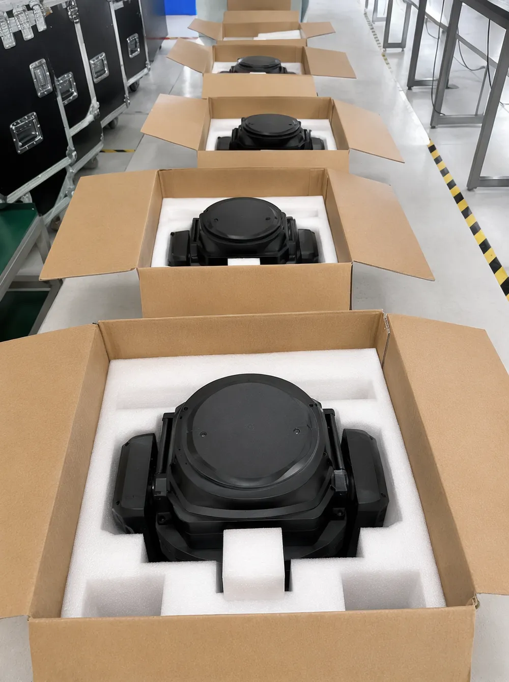 Custom EPE foam packaging for moving head stage lighting with yoke locks engaged