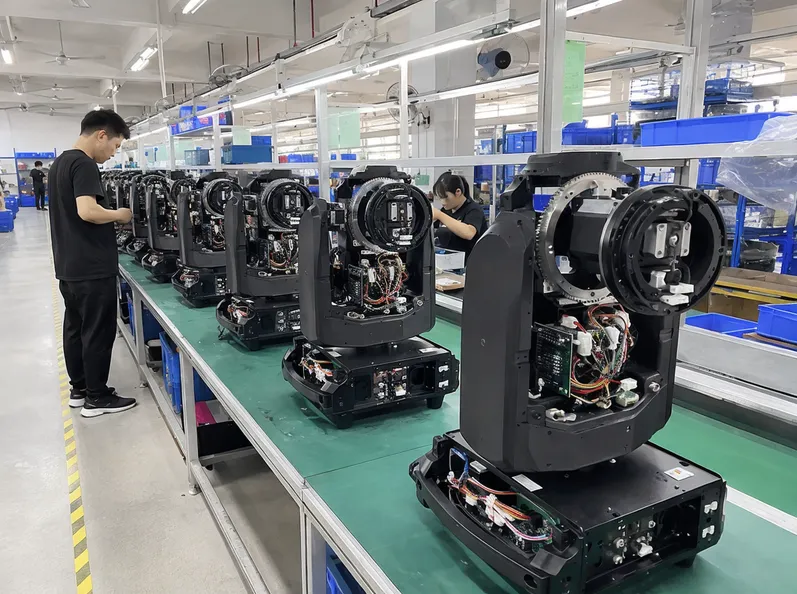 GDMonkey Production Line 5 — dedicated moving head assembly with pan/tilt motor stations