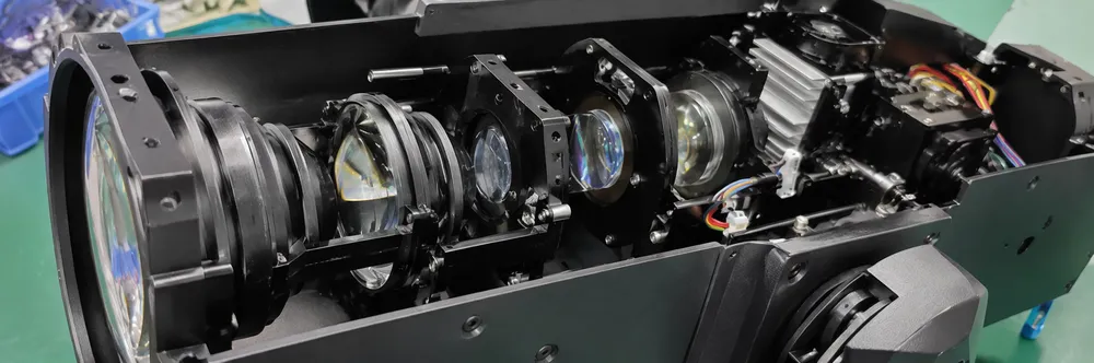 Precision-ground condensing lens assembly inside GDMonkey moving head spotlight optical path