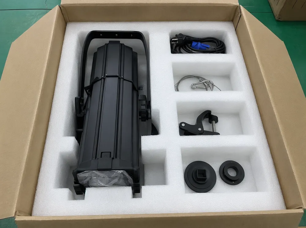 Custom EPE foam cradle packaging for theatre profile spotlight fixtures with accessory compartments