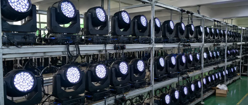 GDMonkey factory burn-in testing rack with wedding lighting fixtures running at full load during 48-hour quality assurance cycle
