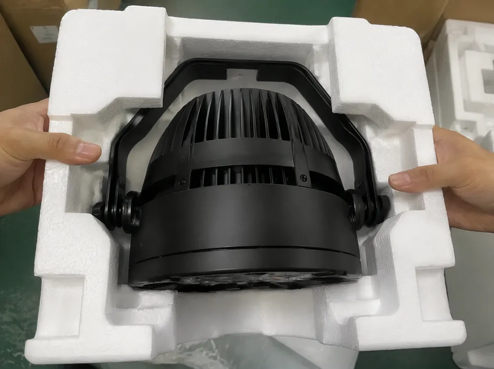 Wedding lighting fixture in molded-foam packaging held at structural mounting points